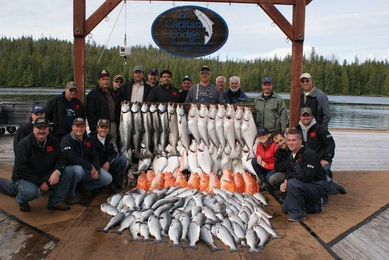 Guests and guides with the day’s catch on the dock